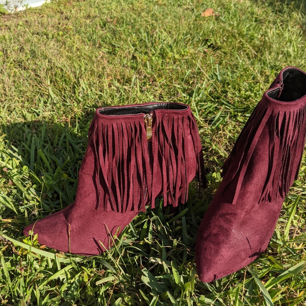 Maroon high heeled booties with fringe